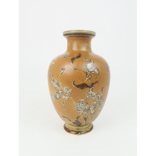 207 - A MARTIN BROTHERS POTTERY STONEWARE VASEof shouldered tapering form, decorated with slipper orchids ... 