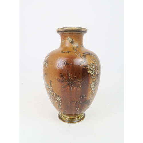 207 - A MARTIN BROTHERS POTTERY STONEWARE VASEof shouldered tapering form, decorated with slipper orchids ... 