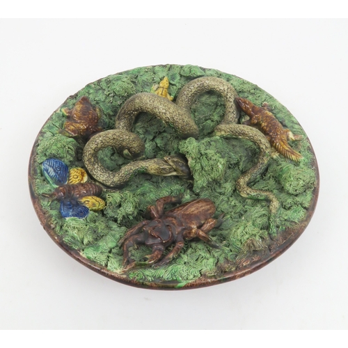 209 - A MAFRA CALDAS PALISSY STYLE MAJOLICA CHARGERthe textured ground decorated with snakes, stag beetle,... 