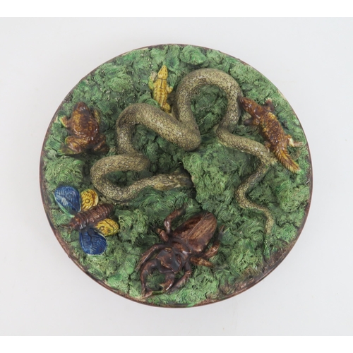 209 - A MAFRA CALDAS PALISSY STYLE MAJOLICA CHARGERthe textured ground decorated with snakes, stag beetle,... 