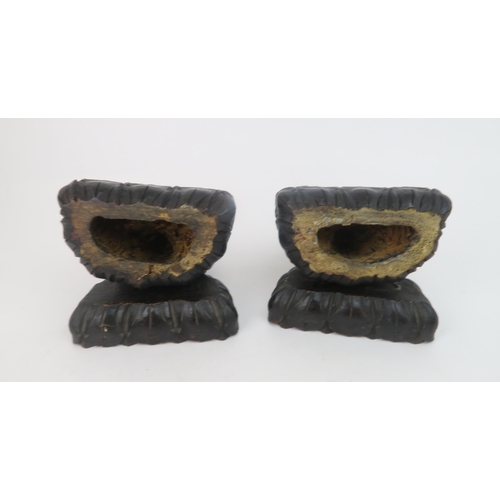 325 - A PAIR OF ASIAN HARDWOOD CARVINGS OF BUDDHAeach seated on a lotus base, 31cm high... 