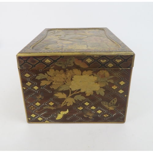 329 -  A JAPANESE GOLD LACQUERED BOXwith shaped cover and base drawer,decorated with birds, butterfli... 