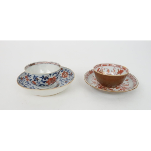 335 - A CHINESE IMARI TEAPOT AND COVERpainted with foliage, 23cm wide, two bowls, 19 and 23cm diameter, tr... 