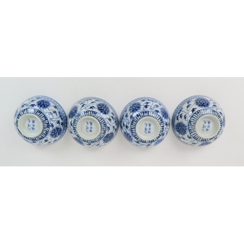 344 - A GROUP OF CHINESE BLUE AND WHITE CERAMICScomprising; four rice bowls painted with peonies and meand... 