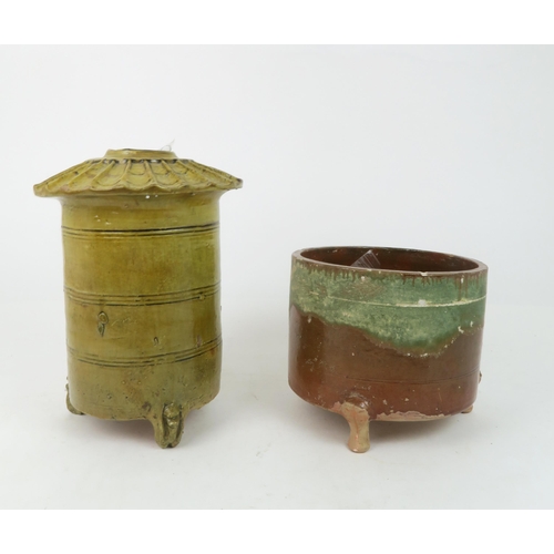 362 - A YELLOW GLAZED FUNERARY POTTERY GRANARY JARmodelled as a granary with canted rim, the body with inc... 