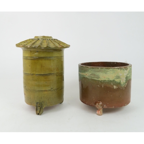 362 - A YELLOW GLAZED FUNERARY POTTERY GRANARY JARmodelled as a granary with canted rim, the body with inc... 