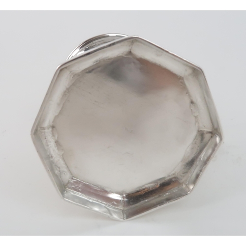 405 - A VICTORIAN SILVER TANKARDof faceted form, with engraved scrolling foliate decoration to each panel,... 