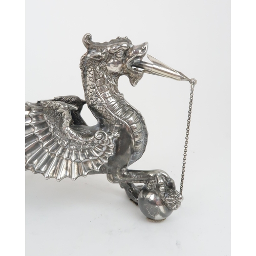 406 - A VICTORIAN SILVER PLATED AND ANTELOPE HORN TABLE LIGHTERin the form of a winged dragon resting its ... 