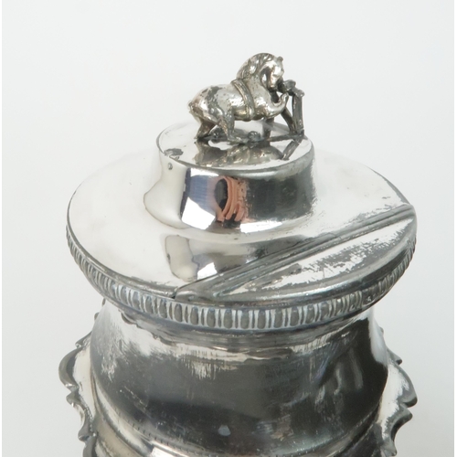 407 - A SILVER MOUNTED RAMS HORN PRESENTATION SNUFF MULLthe hinged cover surmounted by a horse, supported ... 