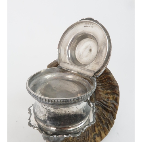 407 - A SILVER MOUNTED RAMS HORN PRESENTATION SNUFF MULLthe hinged cover surmounted by a horse, supported ... 