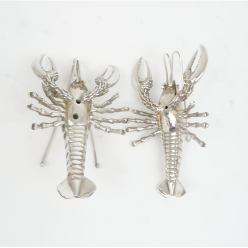 409 - A PAIR OF MODERN ITALIAN SILVER MODELS OF LOBSTERSstamped 925 to the bottom of the tails, Firenze, m... 