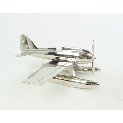 519 - A CHROME PLATED SUPERMARINE S.6B SEAPLANE MODEL OF THE SCHNEIDER TROPHY 193142 x 32cm, and a chrome ... 