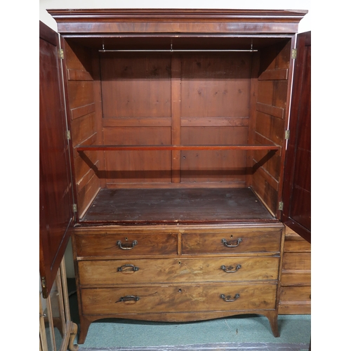 122 - A Victorian mahogany linen press with corniced top above pair of panel doors above two over three dr... 