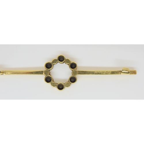 578 - A 15ct sapphire and split pearl bar brooch, by Saunders & Shepherd, weight 3.3gms, a 9ct gold mo... 