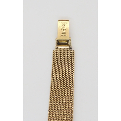 580 - A 9ct gold ladies Rotary watch with integral mesh strap, weight including mechanism 25.8gms