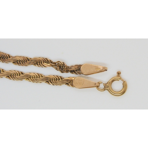 587 - A 9ct gold Italian made chain (af), a 9ct St. Christopher pendant, and other items of gold and yello... 