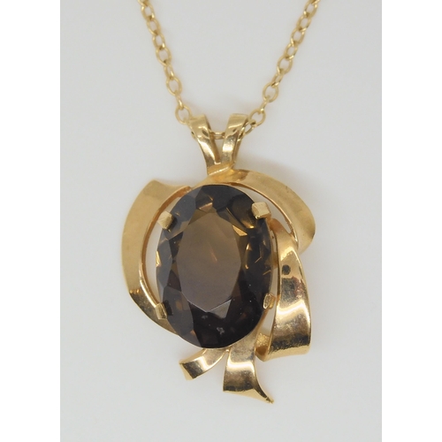 588 - A 9ct gold smokey quartz pendant and chain, wedding ring size V, and two pendants, weight combined 7... 