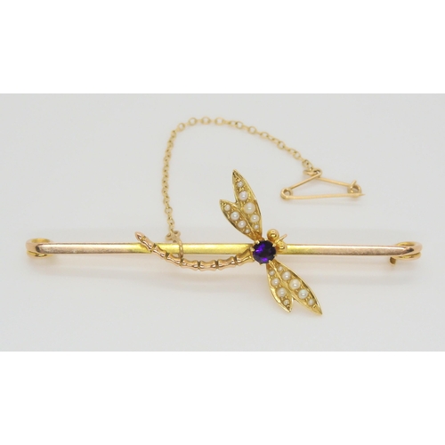 589 - A 9ct gold dragonfly bar brooch set with amethyst and split pearls, length 6.7cm x 2.5cm, weight 5.7... 