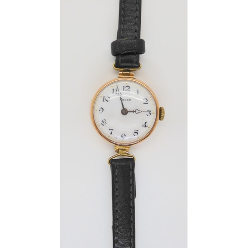 598 - A 9ct gold ladies vintage Rolco watch with leather strap 15.7gms including strap and mechanism.