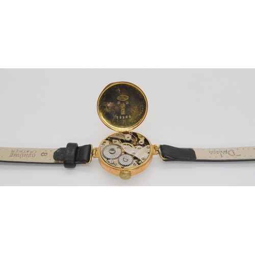 598 - A 9ct gold ladies vintage Rolco watch with leather strap 15.7gms including strap and mechanism.