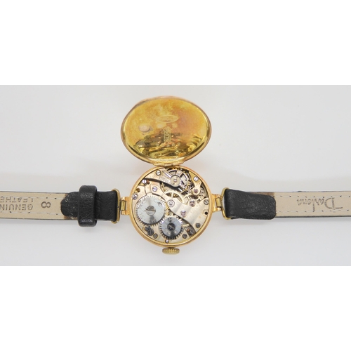 598 - A 9ct gold ladies vintage Rolco watch with leather strap 15.7gms including strap and mechanism.