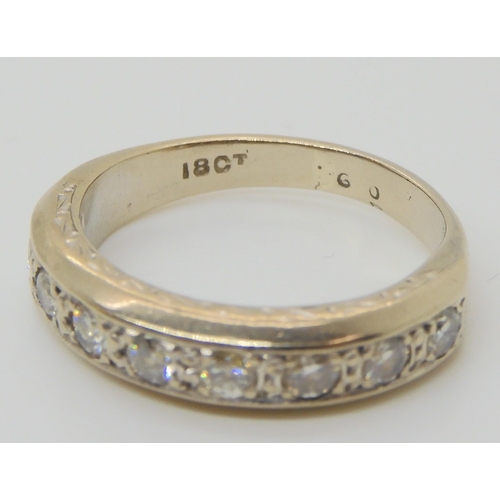 599 - An 18ct white gold diamond half eternity ring set with estimated approx 0.40cts of brilliant cut dia... 