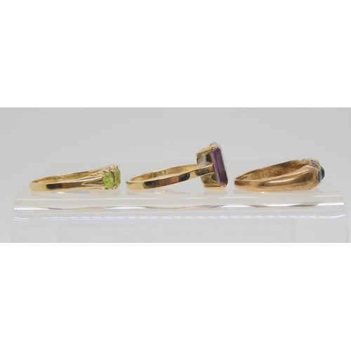 619 - Three 9ct gem set rings, blue gem, size P, peridot, size O and amethyst size N1/2, weight together 6... 