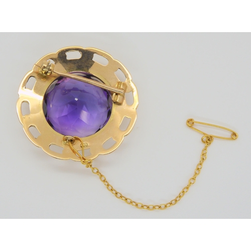 637 - A 9ct gold amethyst brooch, approx diameter of the amethyst 1.9cm, weight 12.1gms