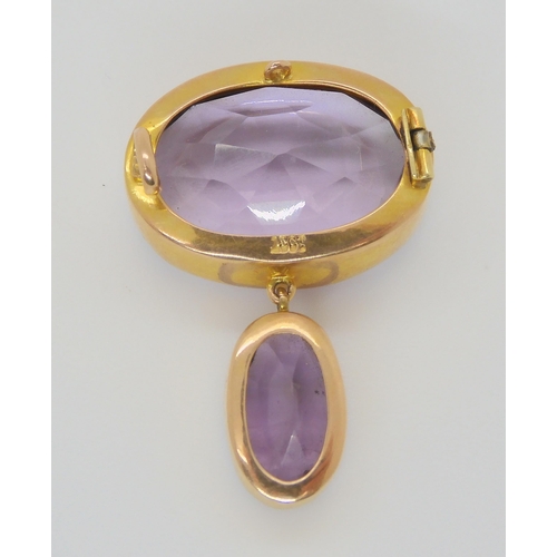 640 - A 15ct gold mounted amethyst pendant brooch, weight 6.8cm, largest amethyst approx 20mm x 15mm, toge... 