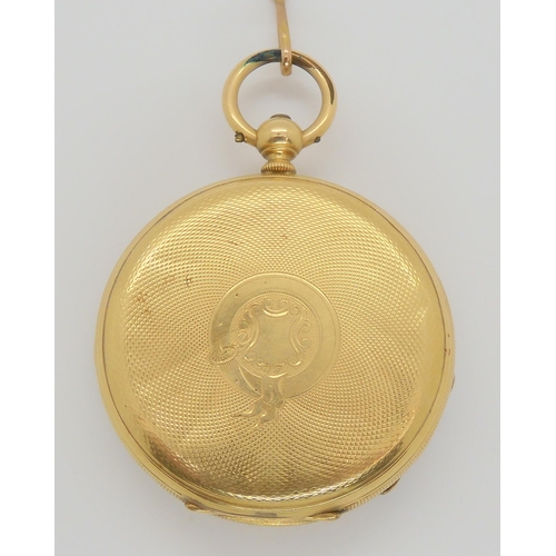 652 - A small pocket watch stamped K18, diameter 3.5cm, inner dust cover metal weight 35.1gms