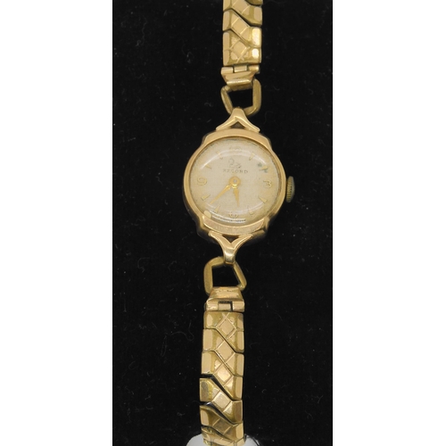 655 - A 9ct gold Record watch and strap, weight including mechanism 19.2gms, together with a further 9ct g... 