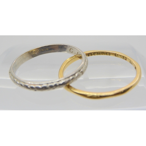 664 - An 18ct gold wedding ring size R, weight 1.5gms, together with a platinum wedding ring with engraved... 