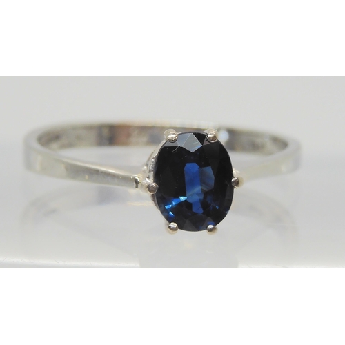 665 - An 18ct gold white gold sapphire ring, sapphire approx 6.5mm x 5.2mm x 3mm, size Q1/2, weight 2.4gms