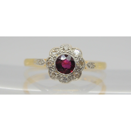 677 - An 18ct vintage lab grown ruby and diamond cluster ring, size Q1/2, weight 2.4gms 