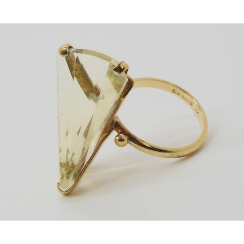 682 - A retro ring, set with an unusual shaped citrine, hallmarked London 1968, size M1/2, weight 6.7gms&n... 