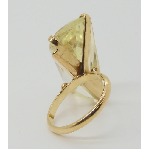 682 - A retro ring, set with an unusual shaped citrine, hallmarked London 1968, size M1/2, weight 6.7gms&n... 