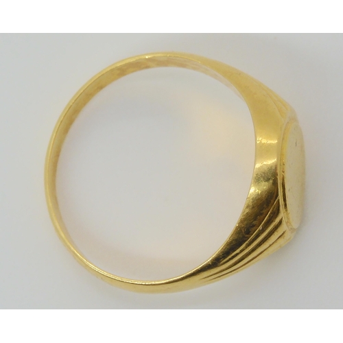 689 - An Italian made 18ct gold signet ring  size X, weight 4.1gms