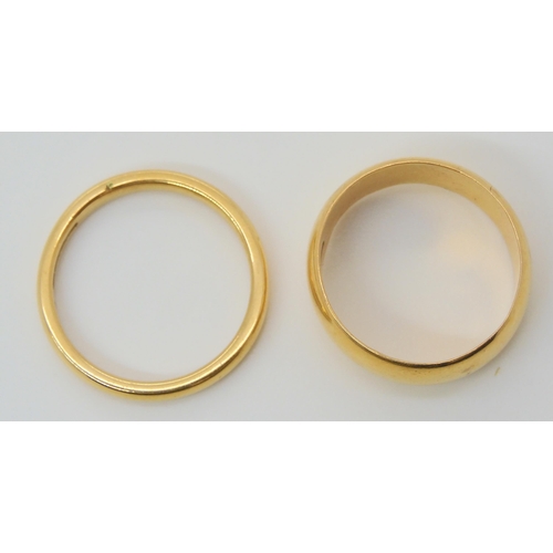 693 - Two 22ct gold wedding rings, wide band hallmarked Chester 1901, size N, and a Birmingham 1861 hallma... 