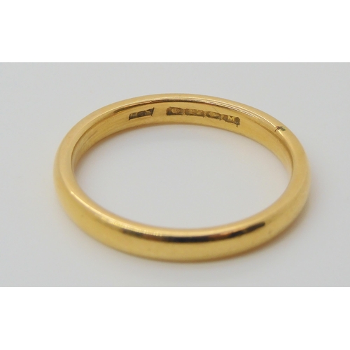 693 - Two 22ct gold wedding rings, wide band hallmarked Chester 1901, size N, and a Birmingham 1861 hallma... 