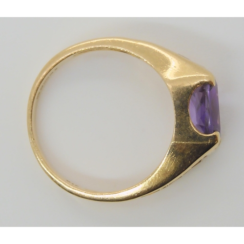 697 - A 9ct gold amethyst and citrine ring, size O, weight 3.6gms 