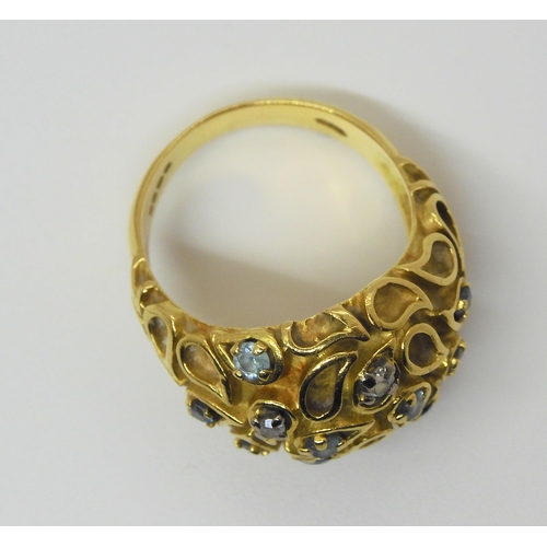 707 - An 18ct gold diamond and mixed blue gem dome ring, size S, weight 12.8gms, together with a yellow me... 