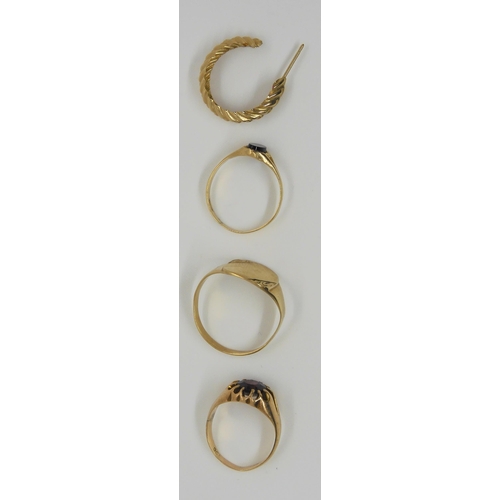 711 - Three 9ct gold rings and an odd earring, weight together 5.8gms. Garnet ring size I, onyx size K1/2,... 