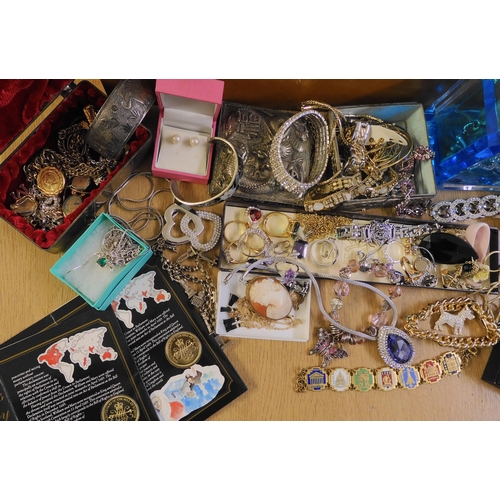 715 - A large collection of vintage and modern costume jewellery and silver in a decorative box