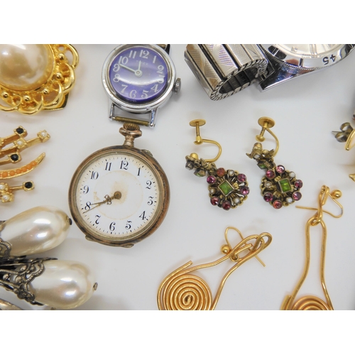 726 - A pair of gilded white metal Austro Hungarian gem set earrings, a continental silver fob watch and a... 