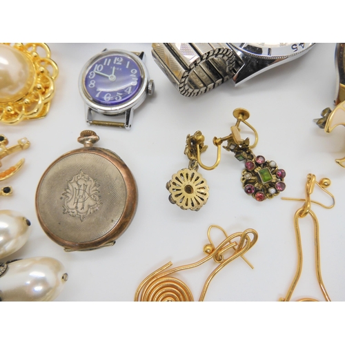 726 - A pair of gilded white metal Austro Hungarian gem set earrings, a continental silver fob watch and a... 