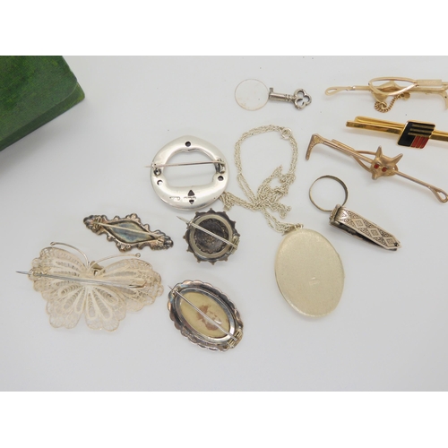 735 - A collection of silver jewellery to include Victorian brooches, a Garnet set Annular brooch etc