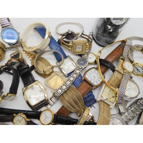 738 - A large collection of fashion watches to include Swatch