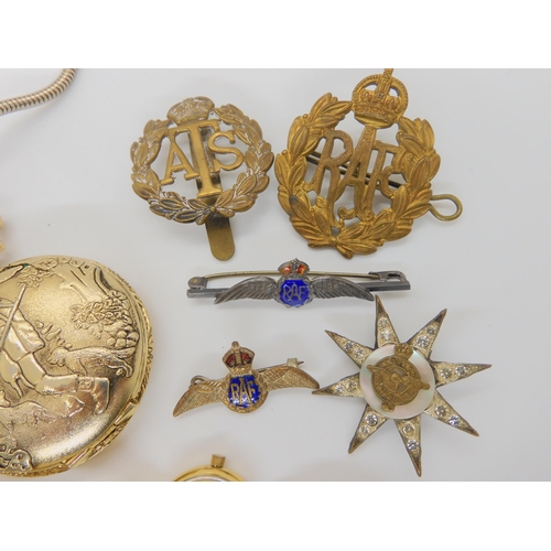 739 - A white metal RAF sweetheart brooch, two others and a cap badge, an ATS cap badge, a 9ct cased ladie... 