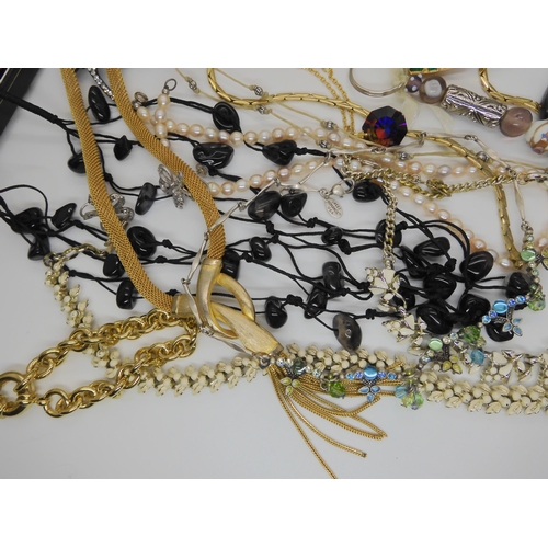 742 - A collection of costume jewellery to include, two Michaela Frey bangles,  Aynsley brooch, an America... 