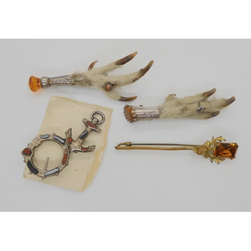 749 - A collection of Scottish themed jewellery to include two grouse foot brooches, two Scottish agate br... 